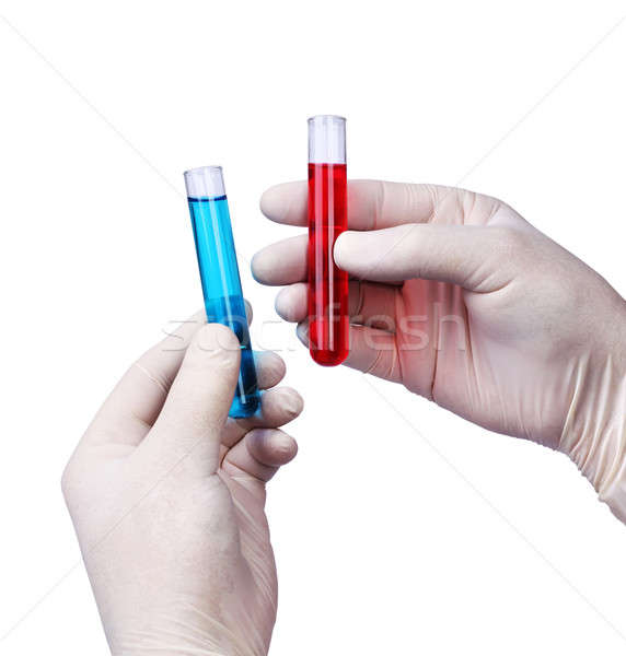 Examining liquids in test tubes Stock photo © Anterovium