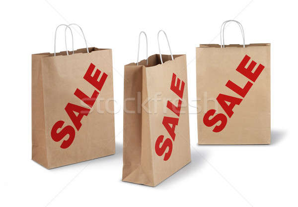 Három barna vásár papírzacskók vásárlás piros Stock fotó © Anterovium
