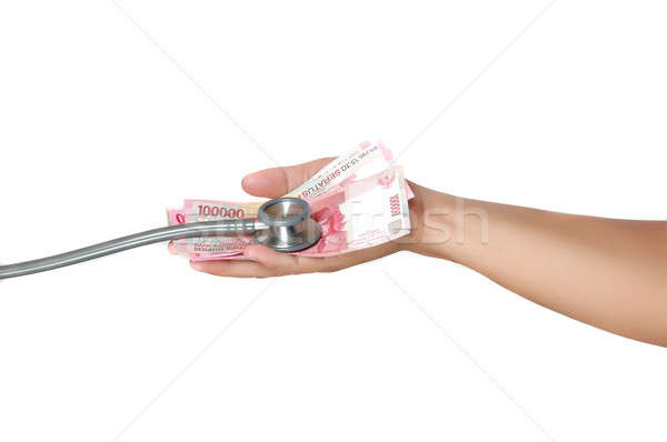 Stock photo: stethoscope on the Indonesia's banknotes 