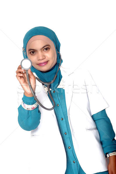 Asiático mulher jovem médico estetoscópio branco Foto stock © antonihalim