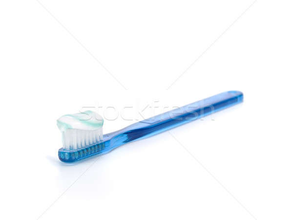 Brosse à dents plein dentifrice bleu isolé blanche [[stock_photo]] © antonprado