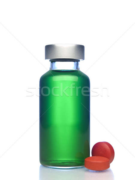Küçük şişe hapları yalıtılmış tok yeşil sıvı Stok fotoğraf © antonprado