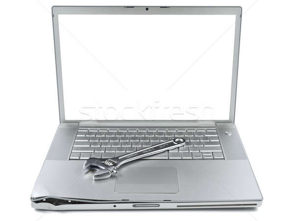 Computer onderhoud moersleutel beschadigd laptop geïsoleerd Stockfoto © antonprado