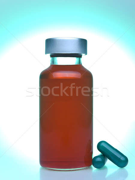 Küçük şişe hapları tok kırmızı sıvı Stok fotoğraf © antonprado