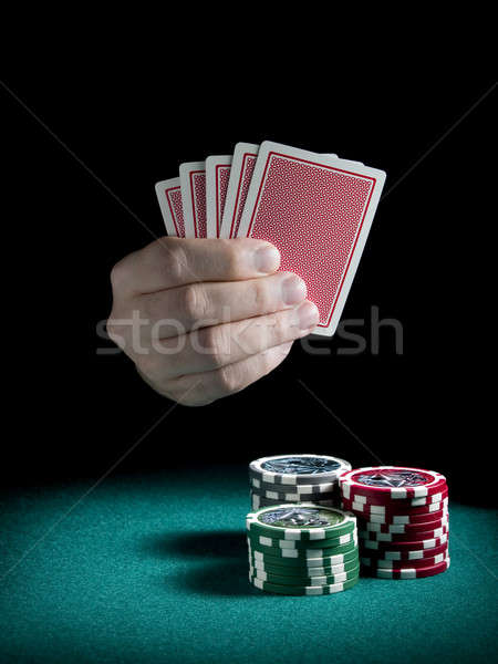 Jogos de azar mão cinco cartões três Foto stock © antonprado