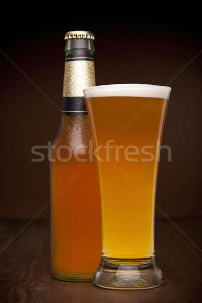 Szkła butelki piwa drewniany stół bar cool Zdjęcia stock © antonprado