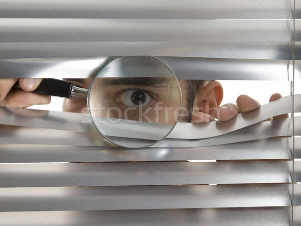 Ekstremalnych człowiek lupą szkła okno młodych Zdjęcia stock © antonprado