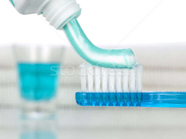 Niebieski rano szczoteczka pasta do zębów szkła usta Zdjęcia stock © antonprado