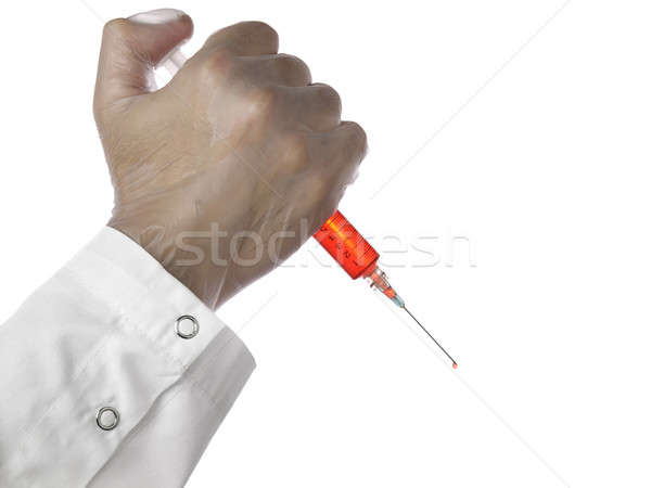 Czerwony wstrzykiwań mężczyzna lekarz strzykawki jak nóż Zdjęcia stock © antonprado
