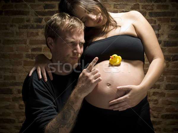Człowiek wskazując palec gumy kaczka ciąży Zdjęcia stock © antonprado