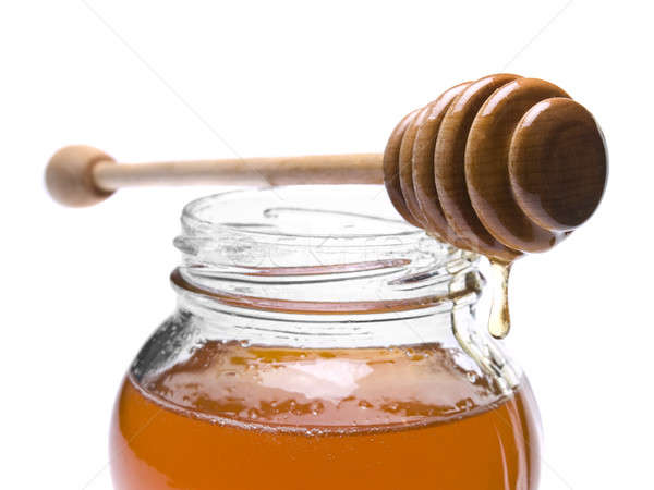 Miele jar legno top isolato bianco Foto d'archivio © antonprado