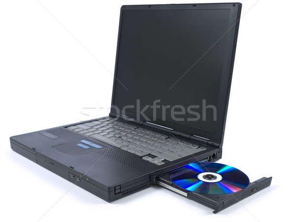 Black laptop and DVD Stock photo © antonprado