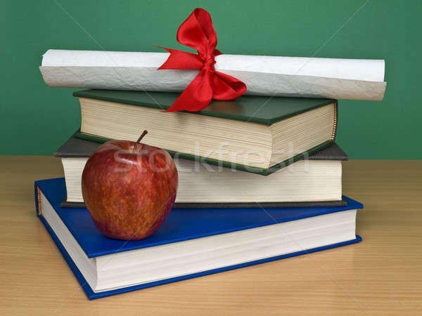 Mezuniyet kitaplar elma diploma Stok fotoğraf © antonprado
