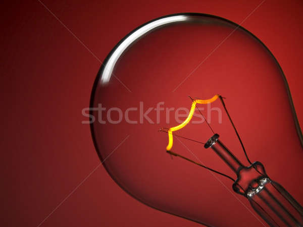 Stock photo: Bulb light over red