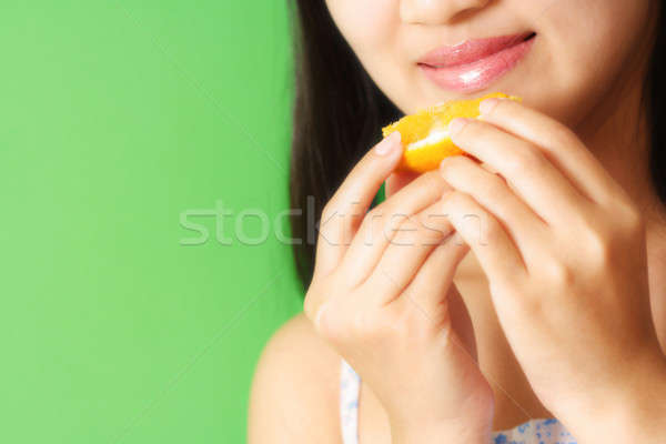 Eating orange Stock photo © aremafoto