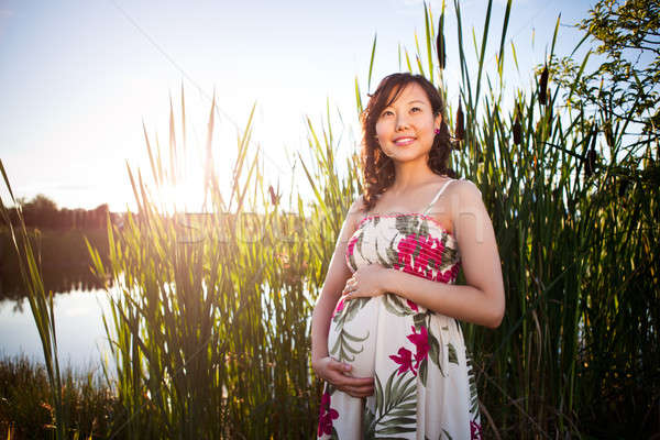 Incinta asian donna outdoor felice Foto d'archivio © aremafoto