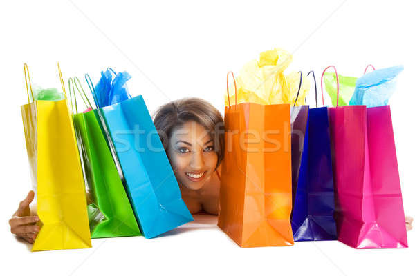 Vásárlás afroamerikai nő izolált lövés bevásárlótáskák kéz Stock fotó © aremafoto