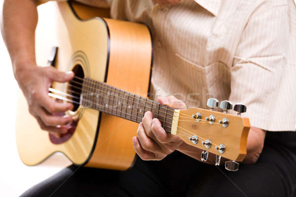 Senior man playing guitar Stock photo © aremafoto