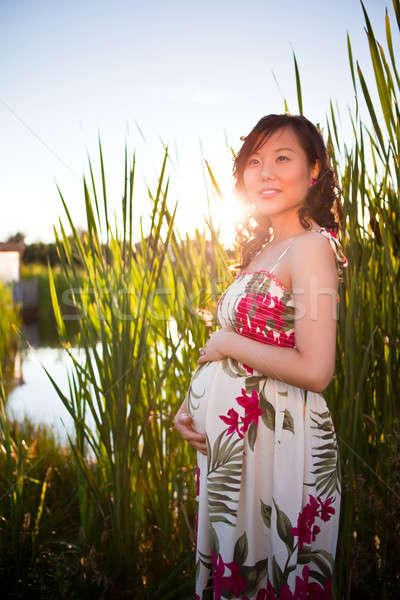 Incinta asian donna outdoor felice Foto d'archivio © aremafoto