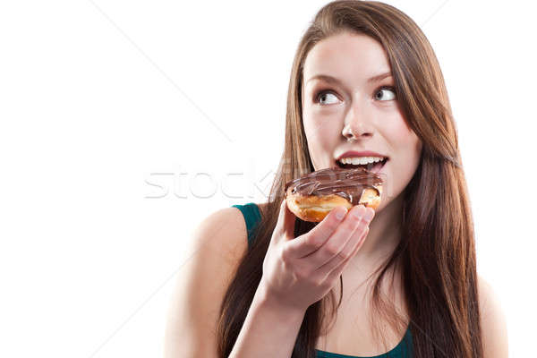Frau Essen Donut isoliert erschossen schönen Stock foto © aremafoto