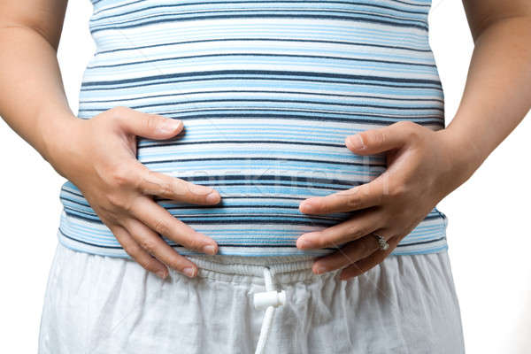 Donna incinta shot stomaco mano felice Foto d'archivio © aremafoto