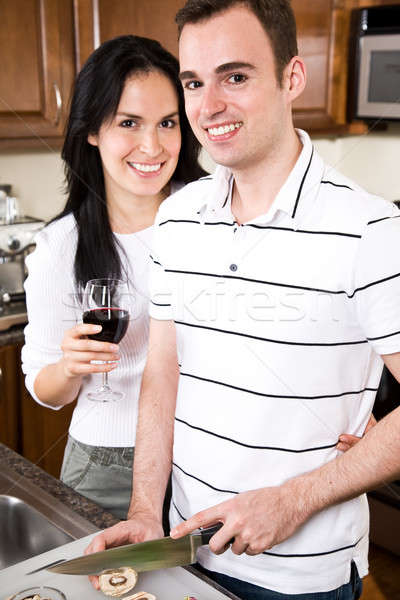 Stock photo: Young couple in the kitchen