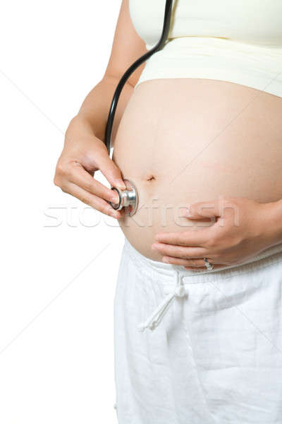 Mujer embarazada aislado tiro escuchar mano feliz Foto stock © aremafoto