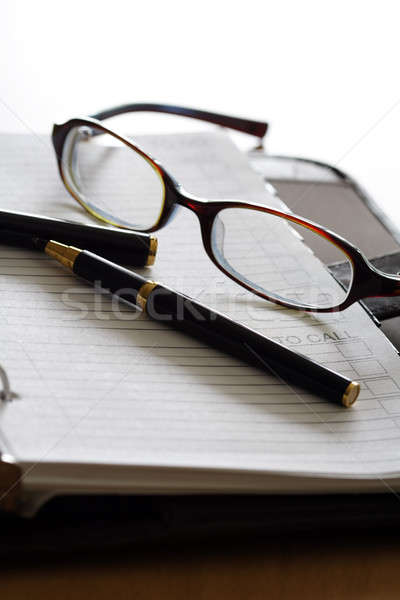 Iş organizatör çift gözlük çalışmak kalem Stok fotoğraf © aremafoto