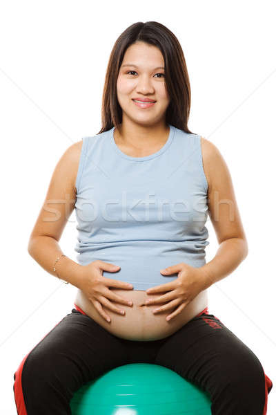 Terhes nő lövés ül testmozgás labda sport Stock fotó © aremafoto