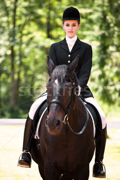 Lovaglás lány kaukázusi lovaglás ló szabadtér Stock fotó © aremafoto