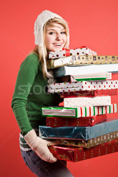 Caucasian girl with gifts on holiday Stock photo © aremafoto