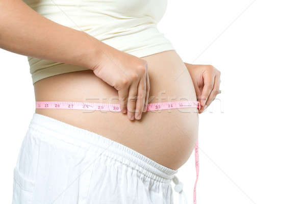 Femme enceinte isolé coup estomac main [[stock_photo]] © aremafoto