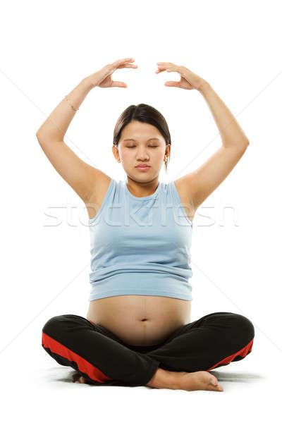 Mulher grávida tiro meditando esportes criança grávida Foto stock © aremafoto