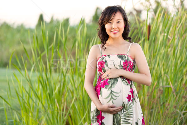 Incinta asian donna outdoor felice Foto d'archivio © aremafoto