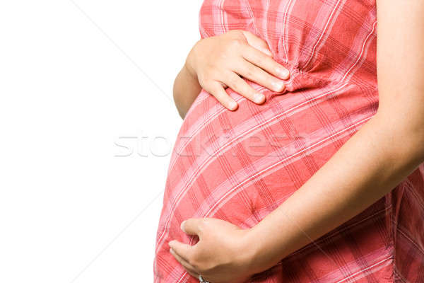 Femme enceinte isolé coup main heureux enfant [[stock_photo]] © aremafoto