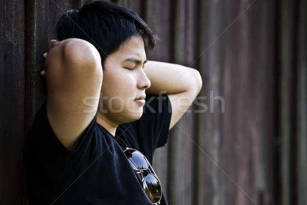 Stressed asian male Stock photo © aremafoto