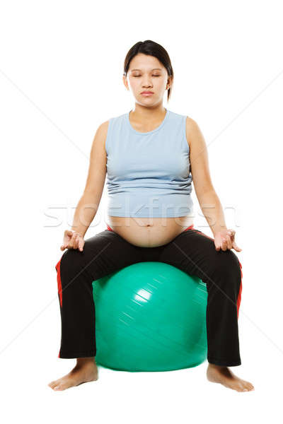 Mulher grávida meditando exercer bola esportes criança Foto stock © aremafoto