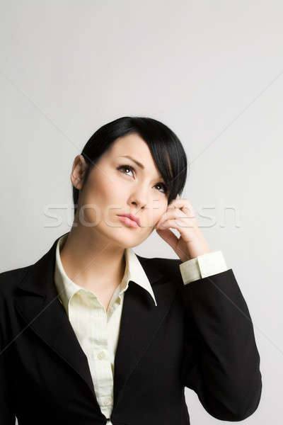 Thinking businesswoman Stock photo © aremafoto