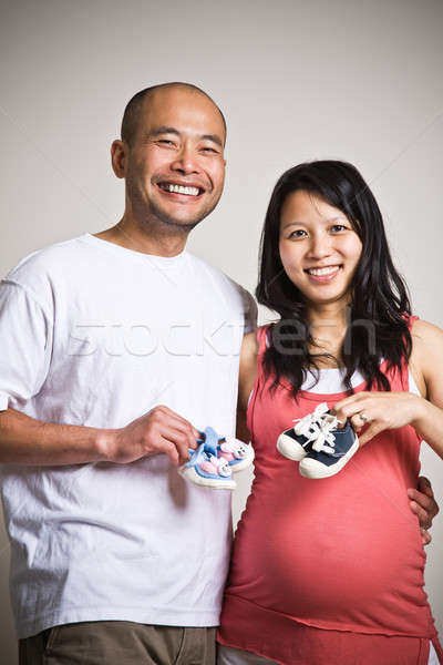 Happy expecting asian couple Stock photo © aremafoto