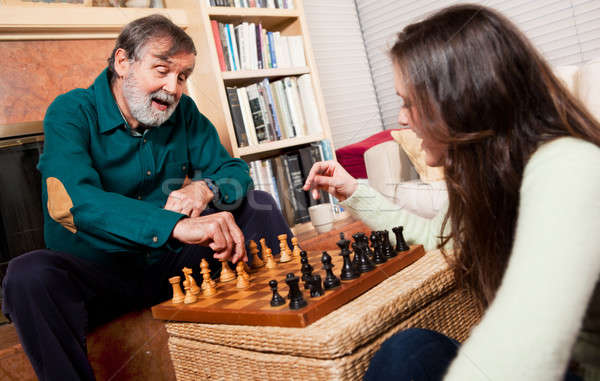 Senior playing chess Stock photo © aremafoto