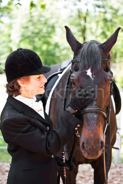 Horseback riding senior woman Stock photo © aremafoto