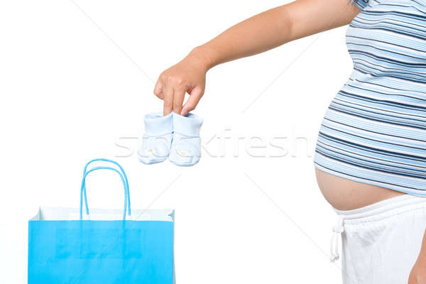 Winkelen zwangere vrouw uit boodschappentas Stockfoto © aremafoto