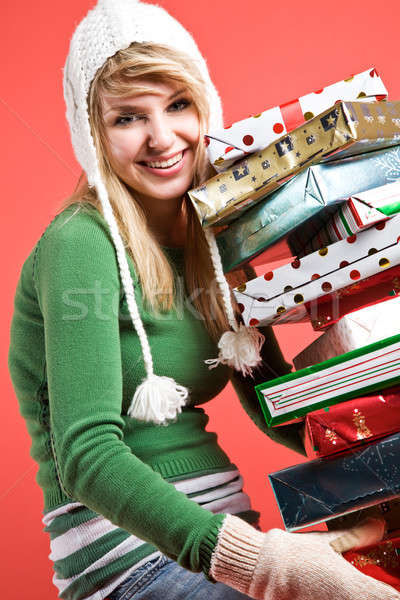 Caucasian girl with gifts on holiday Stock photo © aremafoto