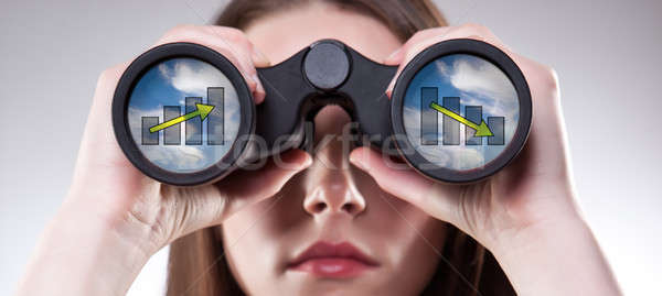 Działalności wizji kobieta interesu patrząc lornetki Zdjęcia stock © aremafoto