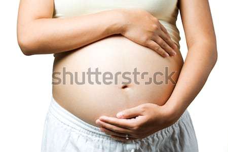 Femme enceinte estomac enfant à naître main heureux [[stock_photo]] © aremafoto