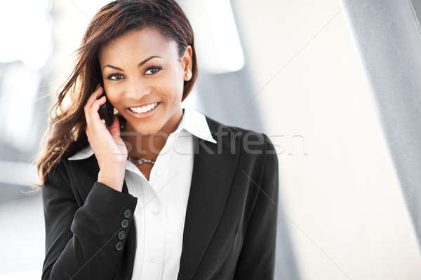 Black businesswoman on the phone Stock photo © aremafoto