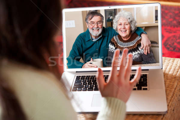 Pareja de ancianos vídeo conferencia tiro mujer Internet Foto stock © aremafoto
