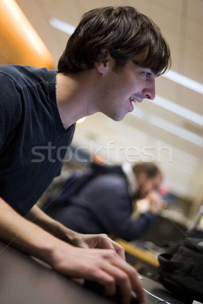 Számítógép felhasználó fiatalember diák személyi számítógép boldogan Stock fotó © ArenaCreative