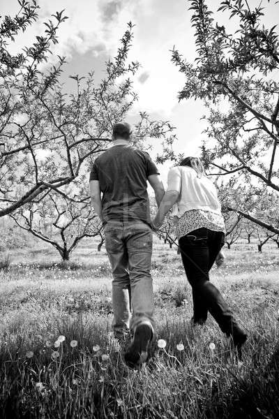 Couple Walking Holding Hands Stock photo © ArenaCreative