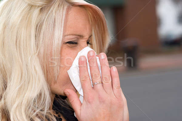 Blowing Her Nose Stock photo © ArenaCreative